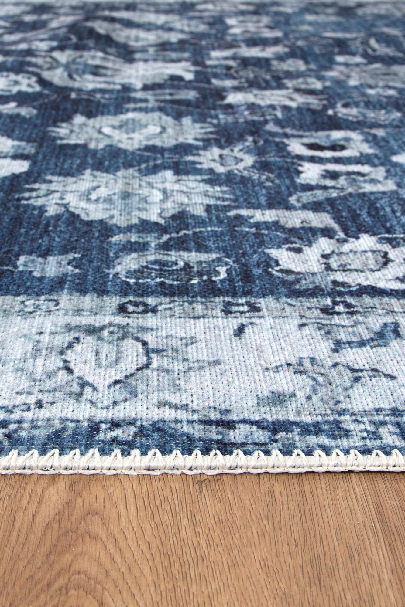 Wedgewood Blue Vintage Area Rug in a floor