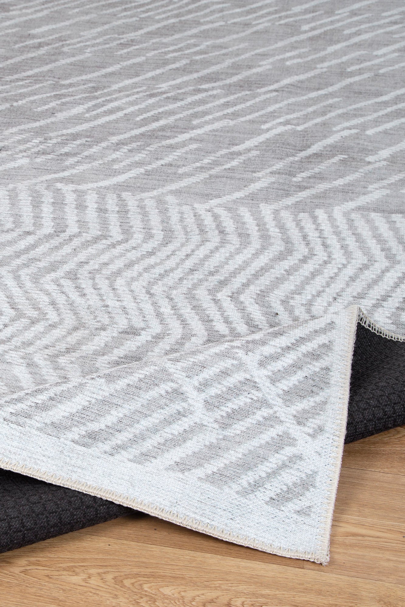 Remi Light Taupe Area Rug folded