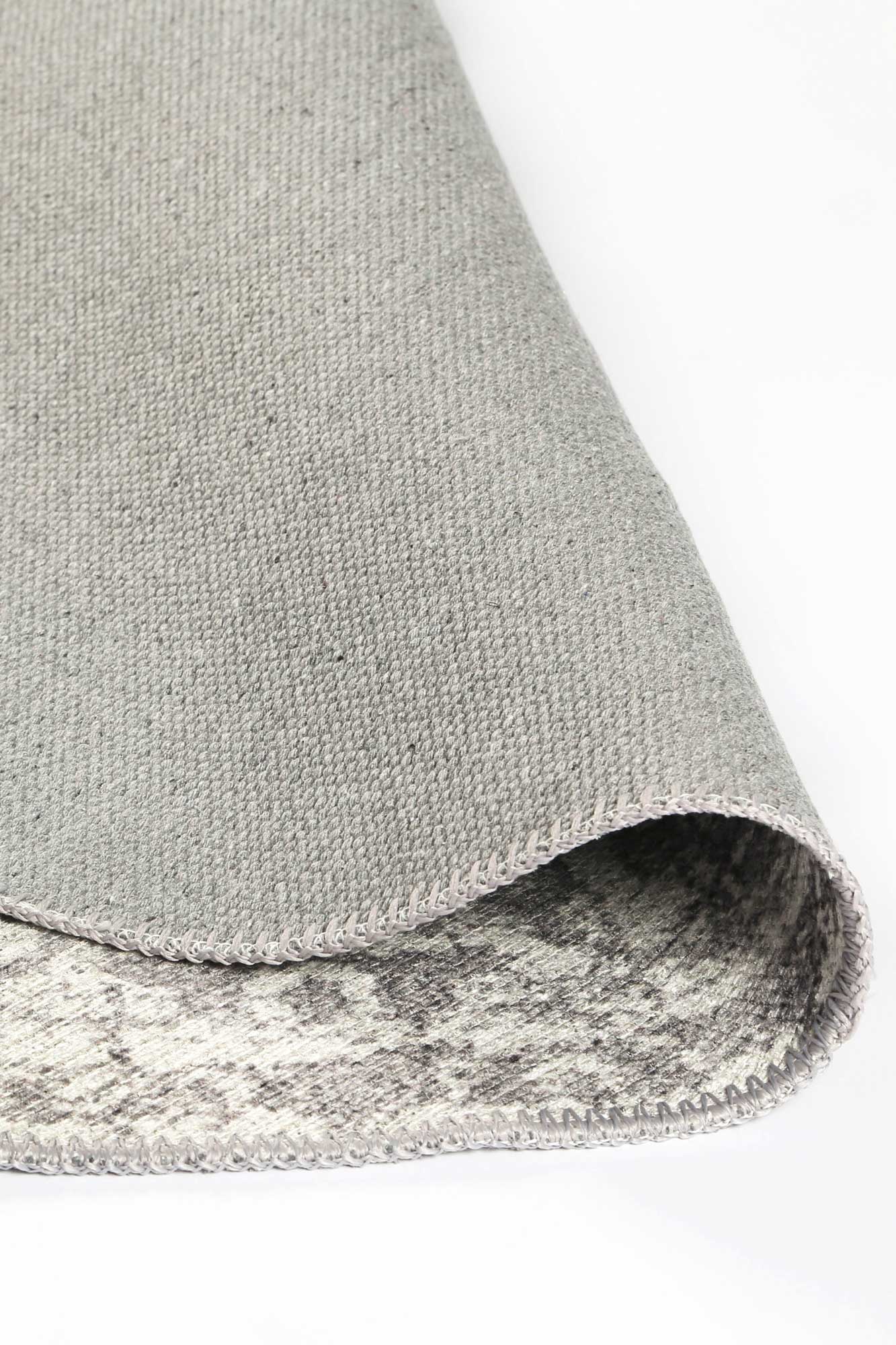 Distressed Vintage Chilaz Grey Round Rug folded