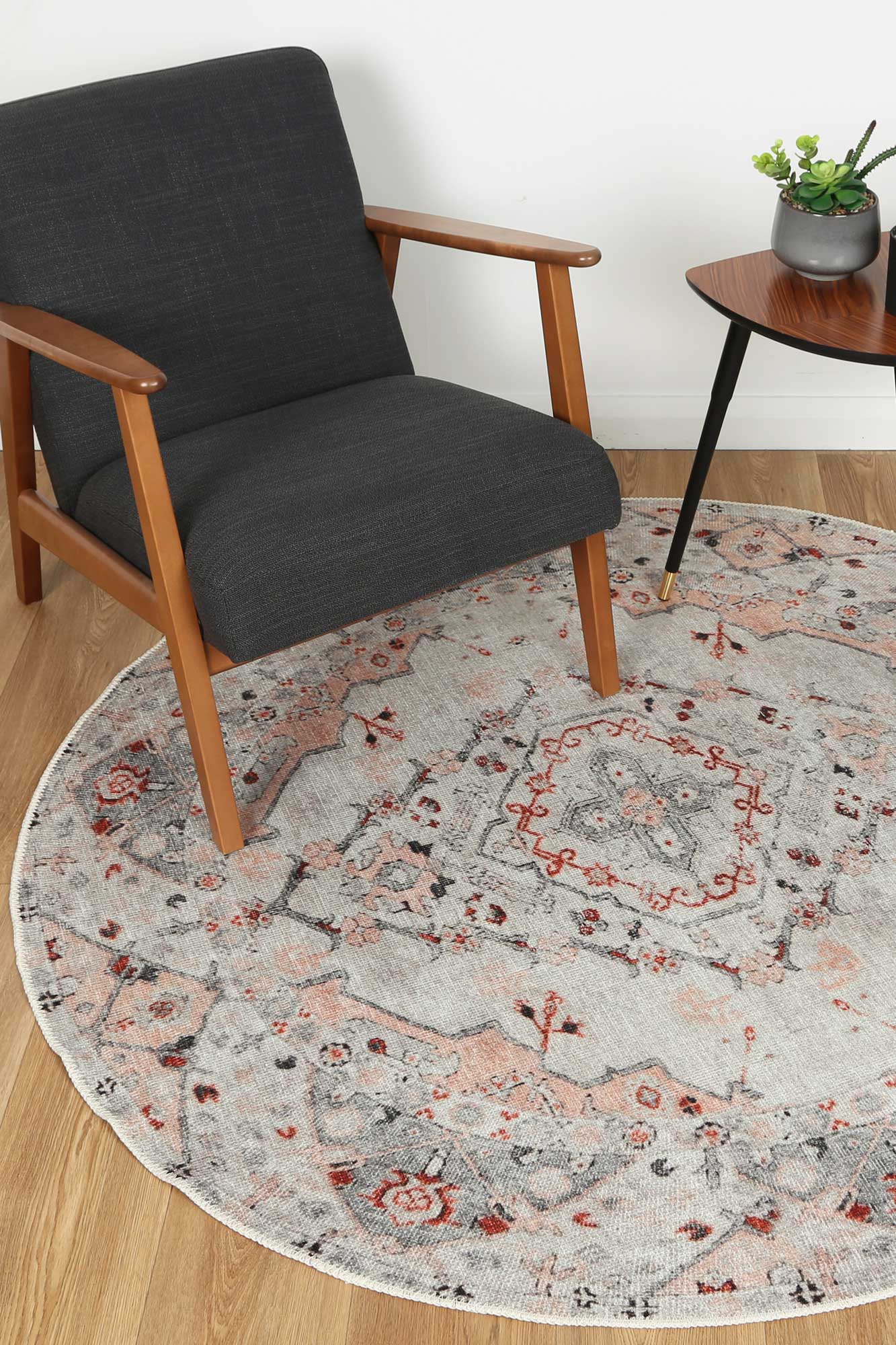 Sauville Blush Multi Round Rug on floor