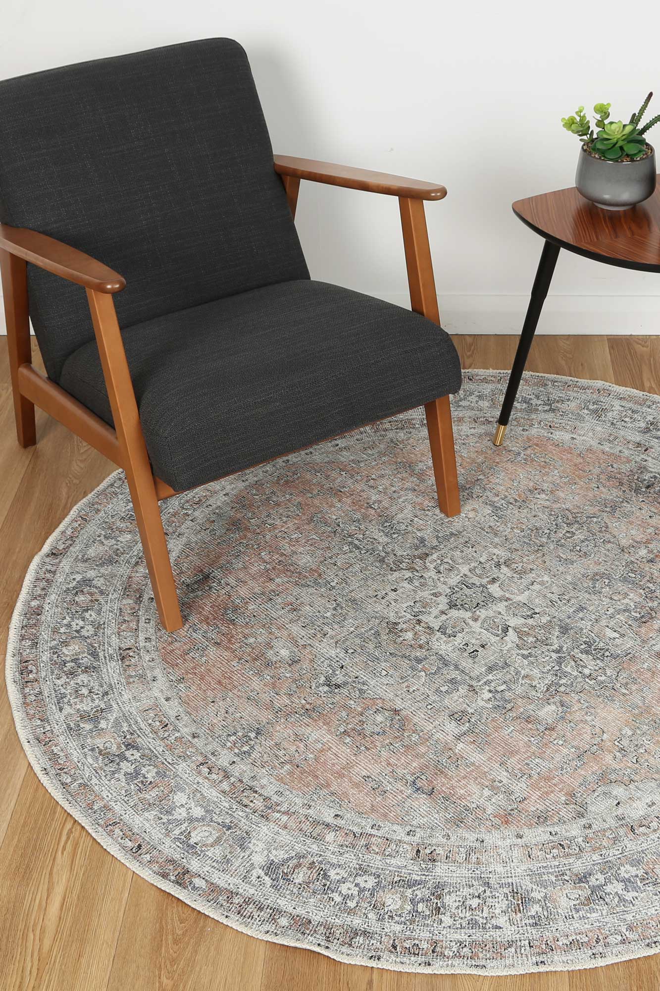 Distressed Vintage Oxus Desert Round Rug under table