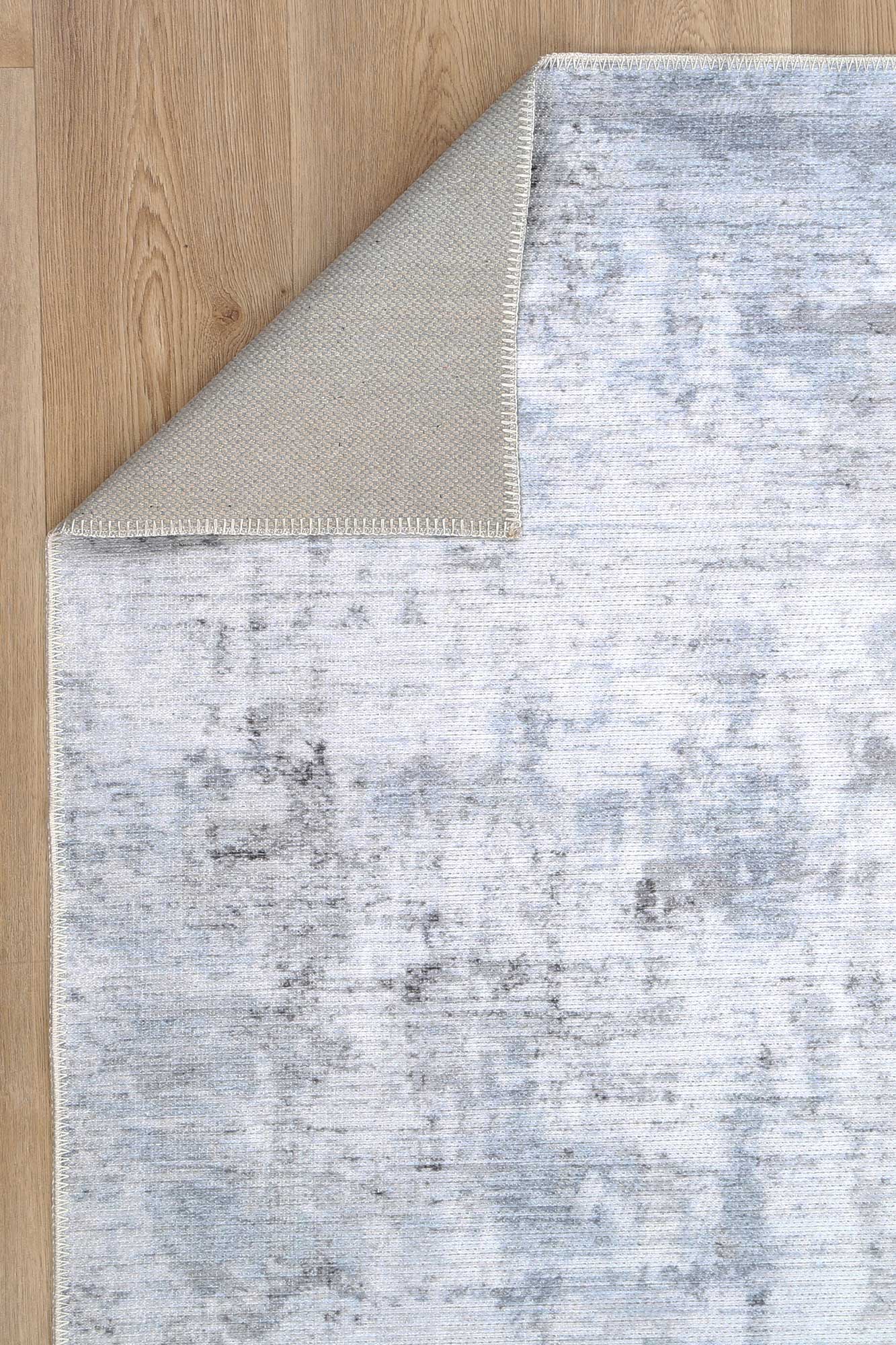 Abstract Evalina Grey Rug folded