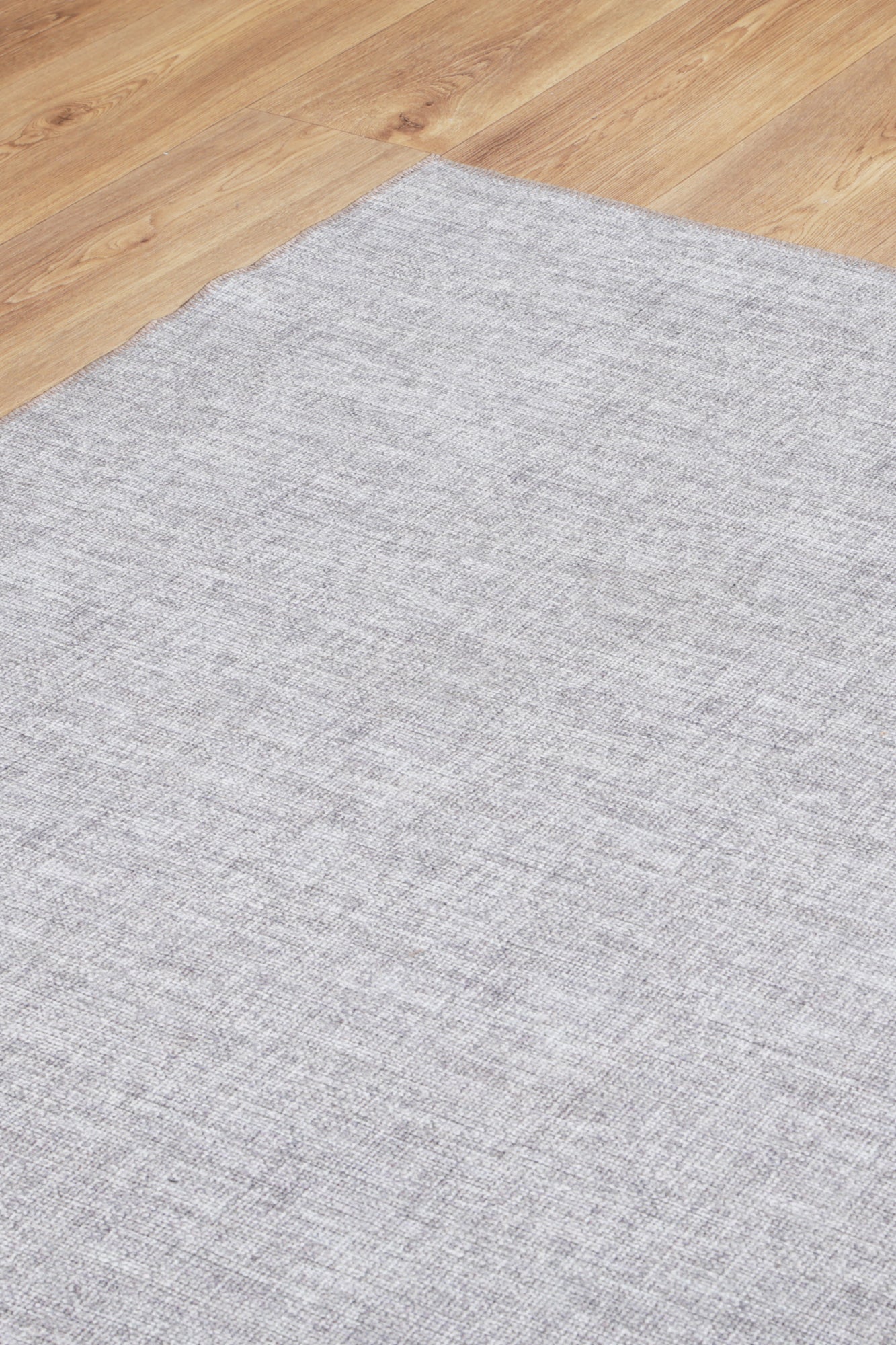 Urban Zinc Solid Area Rug on Floor